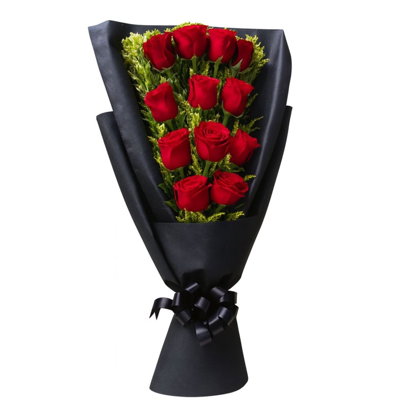 12 Red Roses in Bed